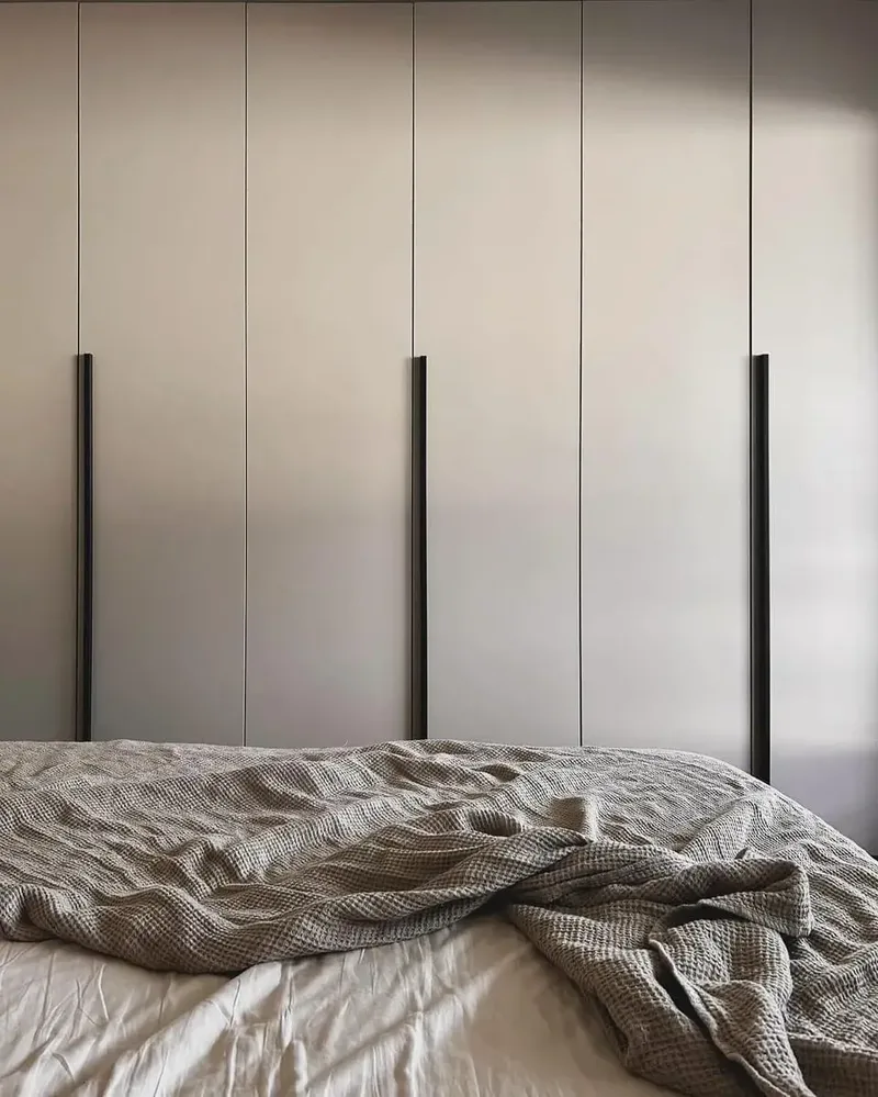Customized wardrobe - Karlsfeld, Germany - FB 229 Elephants Breath matte lacquered with handle 33 RAL8019 matte lacquered