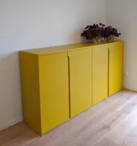 Sideboard: a practical and compact piece of furniture for the entrance, hallway, or even the dining room next to the kitchen, perfect for storing dishes, glasses, or table linens. It is also ideal for an office to keep documents or coffee-making equipment organized.

This sideboard was crafted for our customer&rsquo;s home in Burgau, Germany – RAL1005 matte lacquered with integrated handles.

The exact measurements of this sideboard are 199.5 cm in width, 100 cm in height, and 45 cm in depth.