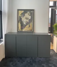 Sideboard: personalized color, dimensions, and designed by our client for their office to make it more functional and aesthetic – Düsseldorf, Germany – matte lacquered in RAL7012 with integrated handles.

The exact measurements of this sideboard are 185.5 cm in width, 110 cm in height, and 61 cm in depth.
